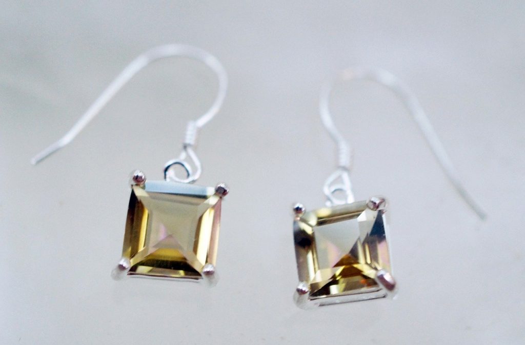 topaz earrings, The meaning of the November birthstone and other facts about Topaz