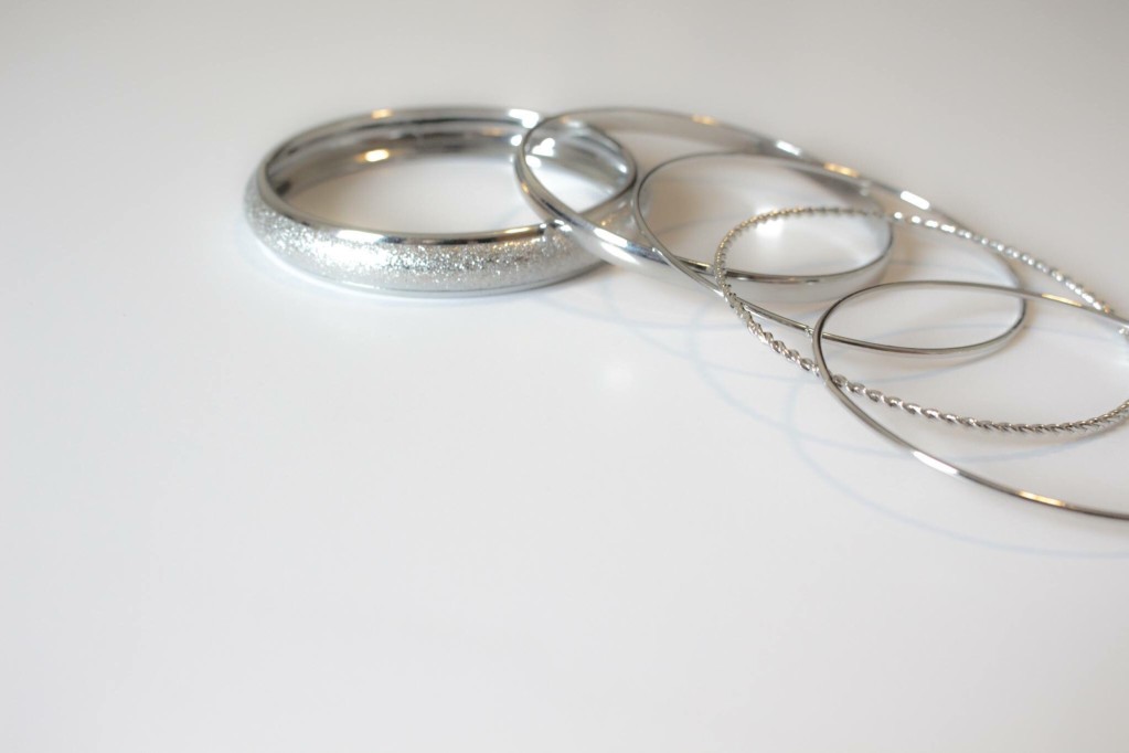 silver rings and bracelets